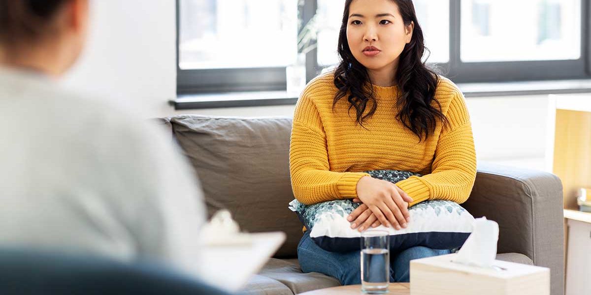 a woman learns about a partial hospitalization program