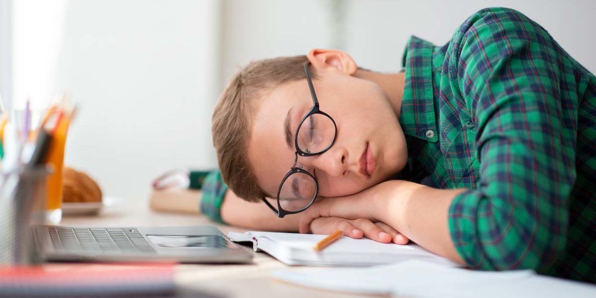 Long-Term Consequences of Heavy Marijuana Use a boy falls asleep in school from heavy marijuana use