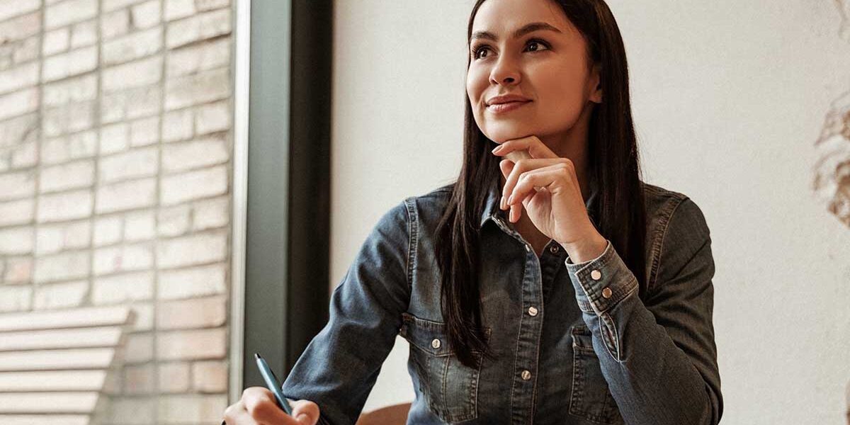 How Do You Prepare for Alcohol Detox a woman sitting taking notes thinks about how to prepare for alcohol detox