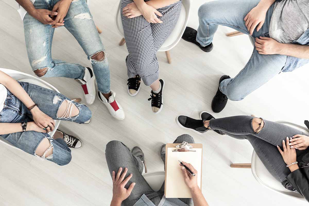 What to Look for in a Heroin Rehab Center a group of people seek treatment at a heroin addiction rehab center