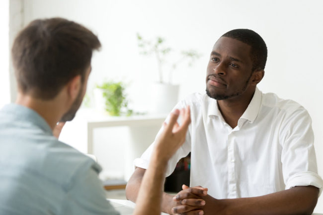 Finding Inpatient Addiction Treatment in Spokane WA two men discuss inpatient addiction treatment in spokane wa