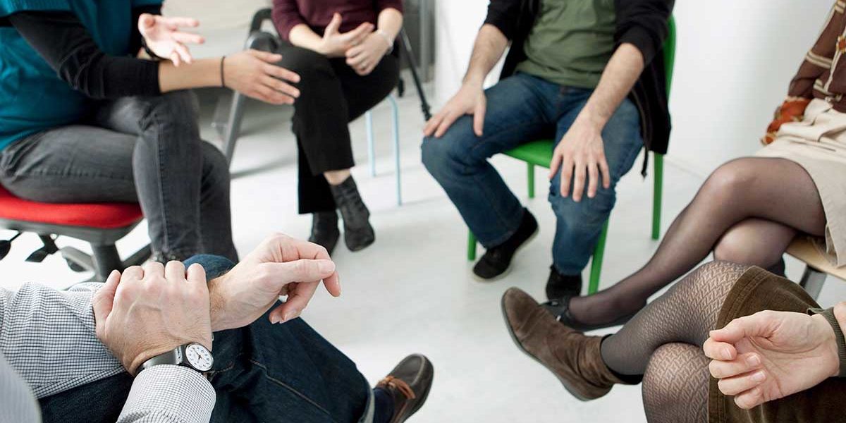 What to Expect from Meth Addiction Rehab a group of people discuss attending a meth addiction rehab