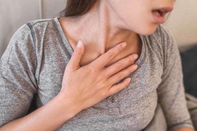 Long Term Effects of Meth woman having trouble breathing and experiencing long term effects of meth