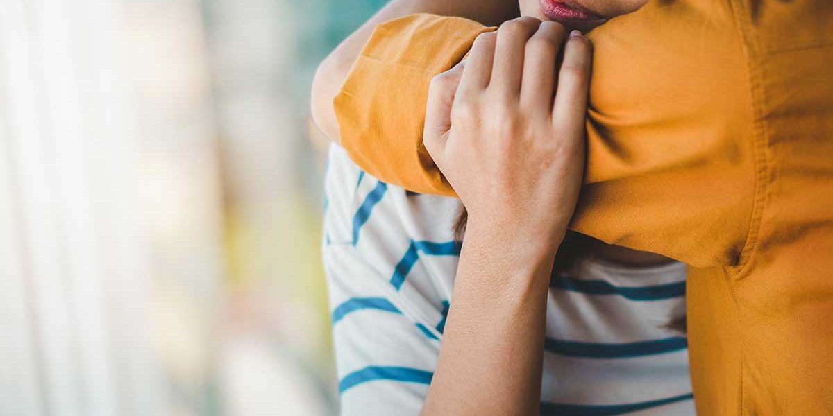 Is-Opiod-Use-Disorder-an-Addiction a person hugs another person consoling them after finding out they might have an opioid use disorder