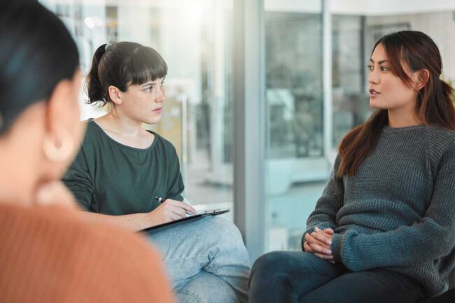 What-Are-the-Advantages-of-a-Womens-Rehab-Program women sit around in a group and discuss the advantages of a women's rehab