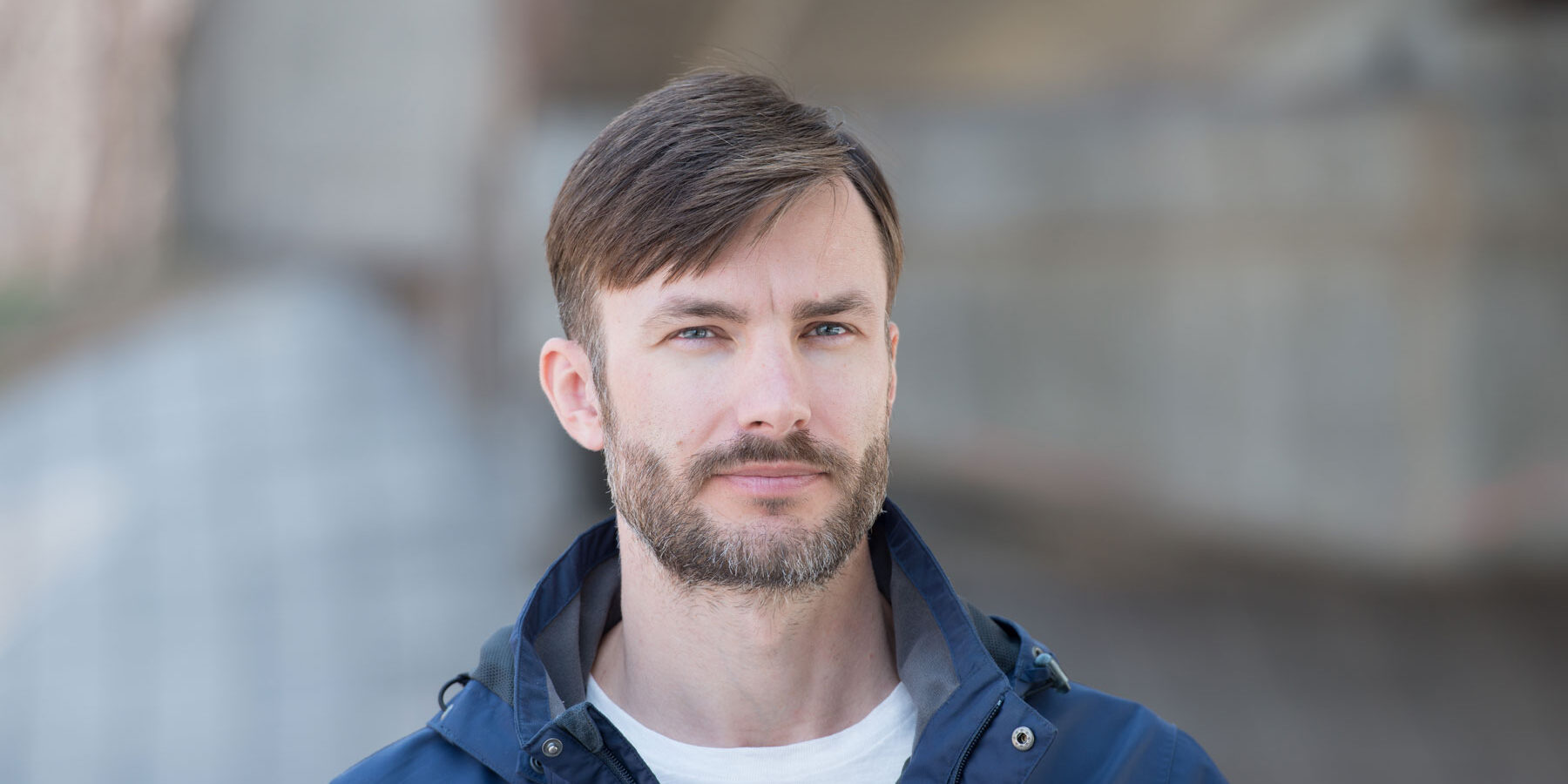 a man in a jacket is outside and wondering if he should go to rehab