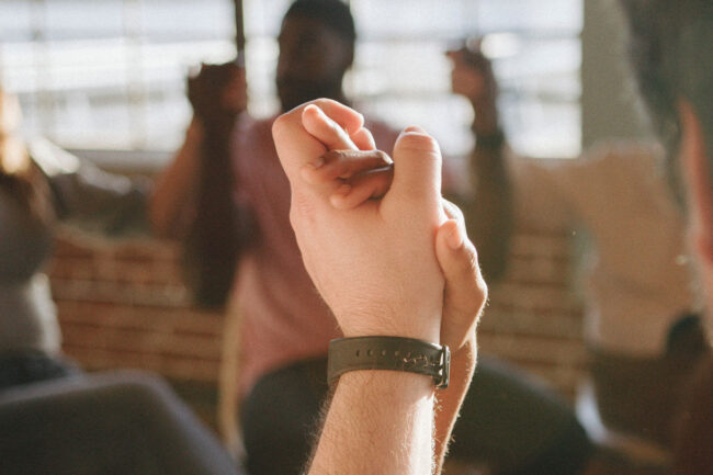 What to expect from your alcohol detox program group in alcohol detox sit together and hold each others hands in support of recovery