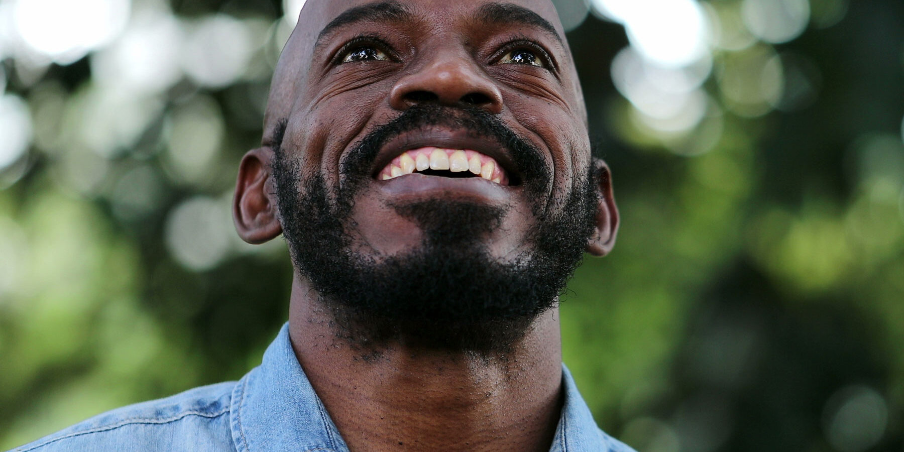 Overcoming Heroin Addiction – Pathways to Recovery and a Healthier Future smiling bearded man is happy after overcoming heroin addiction