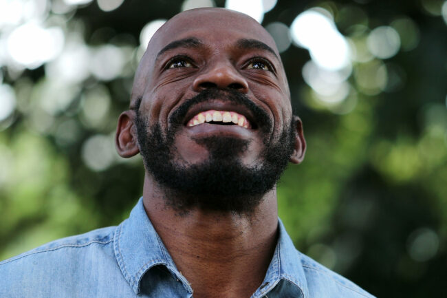 Overcoming Heroin Addiction – Pathways to Recovery and a Healthier Future smiling bearded man is happy after overcoming heroin addiction