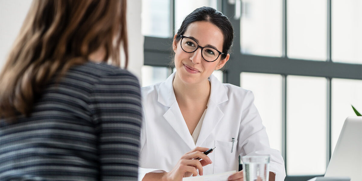 Doctor talking to patient about treatment