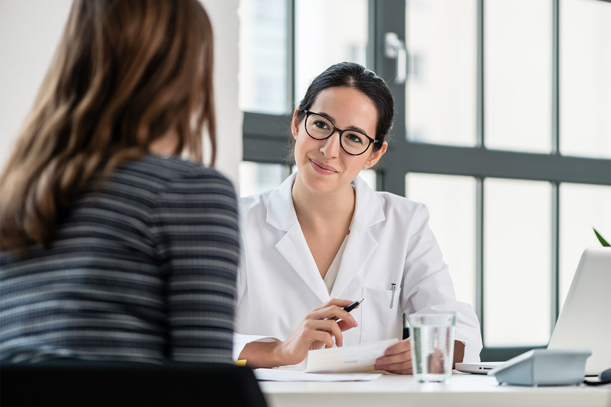 Doctor talking to patient about treatment