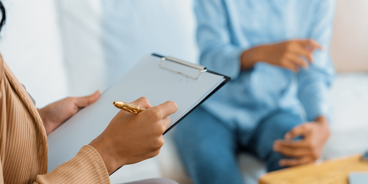 Anxiety-and-Addiction-Recovery—Integrated-Treatment-for-Co-Occurring-Disorders Closeup of clipboard in counseling session