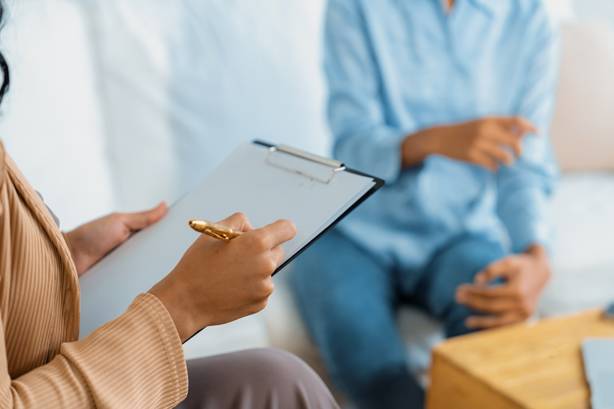 Anxiety-and-Addiction-Recovery—Integrated-Treatment-for-Co-Occurring-Disorders Closeup of clipboard in counseling session