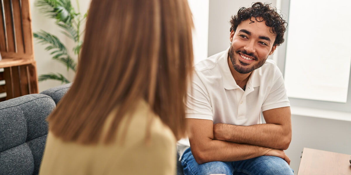 Man speaking to counselor