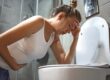 woman feeling sick