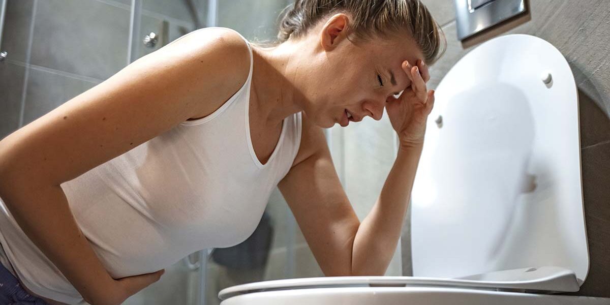 woman feeling sick